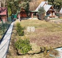 Cottage in Martin with land, wooden shelter, garden with maintained lawn.