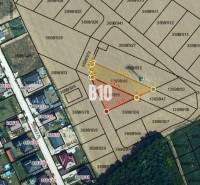 Aerial view of plots and land designated for housing with layout details.