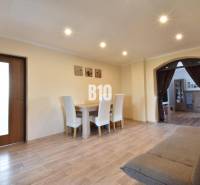 Interior design in a family house combining wooden elements with comfortable furniture.