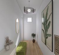 A narrow interior hallway with decorations and wood-patterned flooring in a family house.