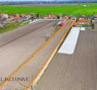 Plots - housing in the village of Baloň, marked plot with a view of the surrounding fields.