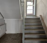 The staircase leads from the ground floor to the first floor of the panel building.