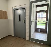 Entrance hallway with an elevator in a 2-room apartment on Sofijská Street, Sídlisko Ťahanovce, Košice.