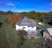A family house in the village environment of Malá Lehota surrounded by green meadows and greenery.