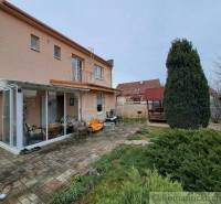 A family house in Veľké Ripňany with a terrace, a winter garden, and a well-maintained garden.