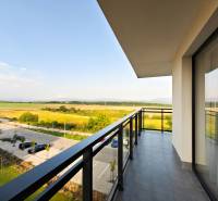 Balcony of a 2-room apartment with a view of nature and a parking lot on Cédrová in Košice.