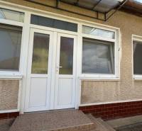 Entrance doors and windows on the family house on Hlavná Street in Radava.