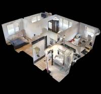 3D floor plan of a 3-room apartment with wood-patterned flooring and furnishings.