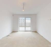 A bright room with glass doors in a family house.