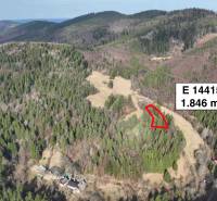 Aerial view of agricultural and forest land in Lazy pod Makytou surrounded by forests.