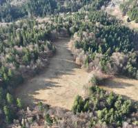 Agricultural and forest land in Lazy pod Makytou with dense forest and open meadows.
