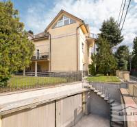 Yellow house with a garden and garage on Krčméryho Street in Bratislava - Old Town.