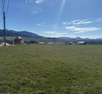 Plots - housing in Kunerad on Borie Street. Grassy area with a view of the mountains.