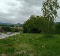 Plots - housing on Chotárna in Žilina with a view of the meadow and trees.