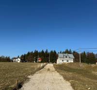 Asphalt road between residential plots, Stránske, Borie.