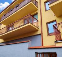 Apartment complex with balconies on Kostolné Square in Kežmarok, ideal for a 2-room apartment.