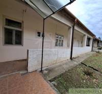 A family house in Mužla with a small yard and a covered terrace.
