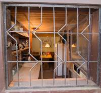 A meticulously designed interior kitchen with wooden decor and a cozy atmosphere of recreational properties.