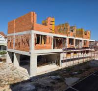 Construction of a 3-room apartment in Srima, with visible unfinished brick walls.