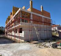 A construction project of a 3-room apartment in Srima, which is under construction with scaffolding.
