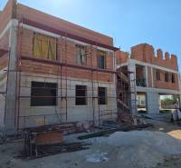 An unfinished 3-room apartment in the town of Srima with scaffolding and construction materials.