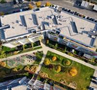 Apartment complex with a playground on Malokrasňanská in Bratislava - Rača, top view.