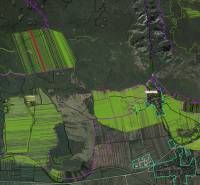 Aerial view of agricultural and forest lands around Dvorníky-Včelár.