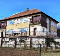 A family house in Kiarov with two floors and a brown roof.