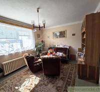 Living room in a country style in a family house with carpet decor.