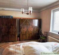 Interior of a family house with classic furniture and a wooden decor floor.