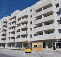 Apartment building on Dukelská in Bernolákovo with parking spaces and gastro premises.