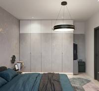 A bedroom in a 3-room apartment with built-in wardrobes and elegant lighting.