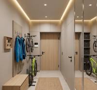 Interior of a 3-room apartment with a wooden decor floor and a mirrored wardrobe.