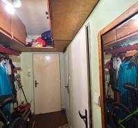 A hallway with storage space and a bicycle in a 3-room apartment.