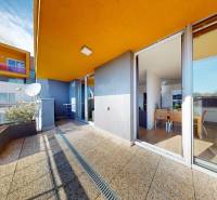 Spacious terrace with access to the kitchen of a 3-room apartment on Staré Grunty.