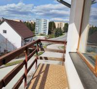 A balcony of a family house on Závršky Street in Myjava with a view of the surrounding buildings.