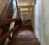 A staircase with a wooden decor in a family house.