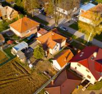 Aerial view of family houses and gardens in Belince105.