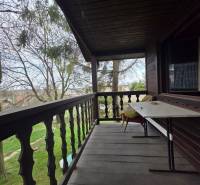 Wooden terrace with a garden view in the location of Bohdanovce for Residential Land.