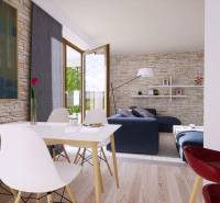 Living room in a family house with a wooden decor floor and stone walls.