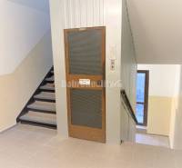 Staircase of an apartment building with an elevator in Prievidza on T. Vansovej, area near a 1-room apartment.
