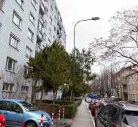 Apartment building on Ondavská Street in Bratislava - Nivy, surrounded by cars and trees.