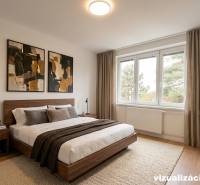 Bedroom in a 3-room apartment with a stylish bed, paintings on the wall, large window.
