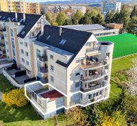 A building with a 3-room apartment on E. Belluš Street in Piešťany surrounded by greenery.