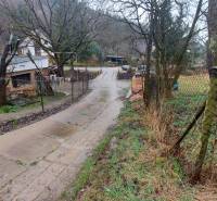 Country houses and roads surrounded by nature on recreational plots near Púchov.