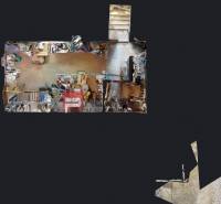 A top-down view of a workshop in a family house with various tools and materials.