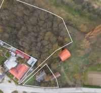 Plots - housing in Moravské Lieskové with multiple buildings surrounded by trees.