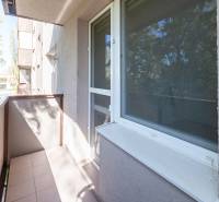 A balcony in a 3-room apartment with a view of greenery in Nové Zámky, Nábrežná Street.