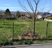 Plots - housing in Ľubotice with fruit trees and a view of the surrounding landscape.