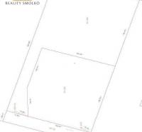A floor plan on a plot in Ľubotice designated for residential use, with exact parcel dimensions.